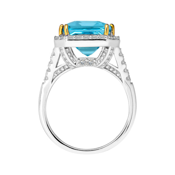 Sterling Silver 8 Carat Blue Topaz Emerald Cut Ring with 18 KGP Prongs