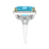 Sterling Silver 8 Carat Blue Topaz Emerald Cut Ring with 18 KGP Prongs