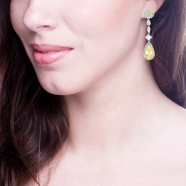 Silver Fancy Light Yellow Regal Teardrops with 18 KGP Prongs