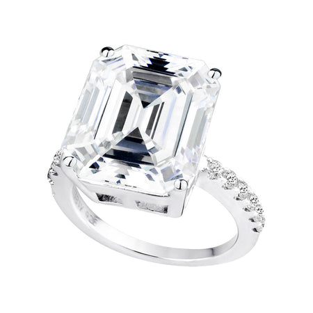 Sterling Silver 8 Carat Blue Topaz Emerald Cut Ring with 18 KGP Prongs
